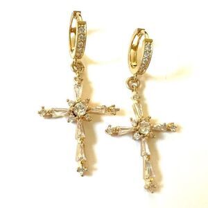 Gold huggie hoop earrings for women with crystal christian religious crosses.